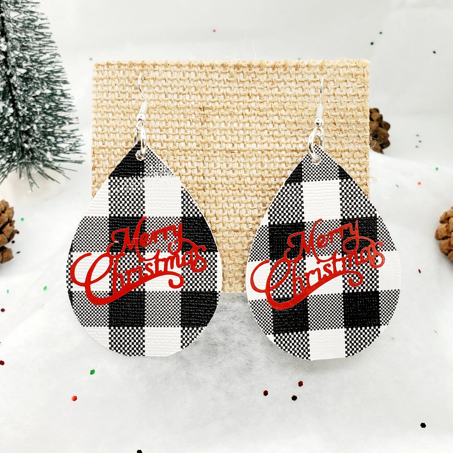 Black and White Buffalo Plaid teardrop earrings with Merry Christmas text in red